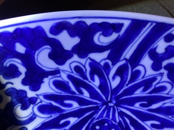 A Chinese blue and white 'lotus scroll' charger, Kangxi